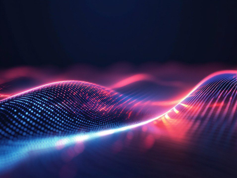 A vivid abstract visualization of a glowing digital wave in blue and magenta, representing quantum data and futuristic technology.